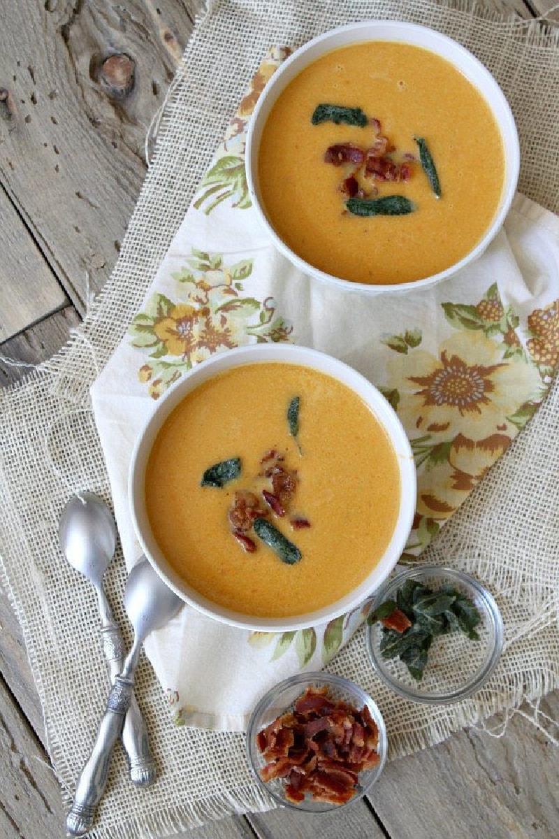 two bowls of sweet potato soup