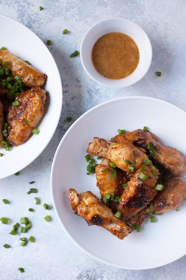 Baked Honey Mustard Chicken Wings on white plates