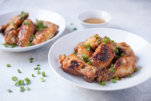 Baked Honey Mustard Chicken Wings  on white plates