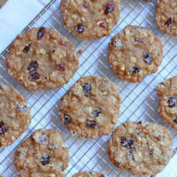 maple cranberry oatmeal cookies on a cooling rack