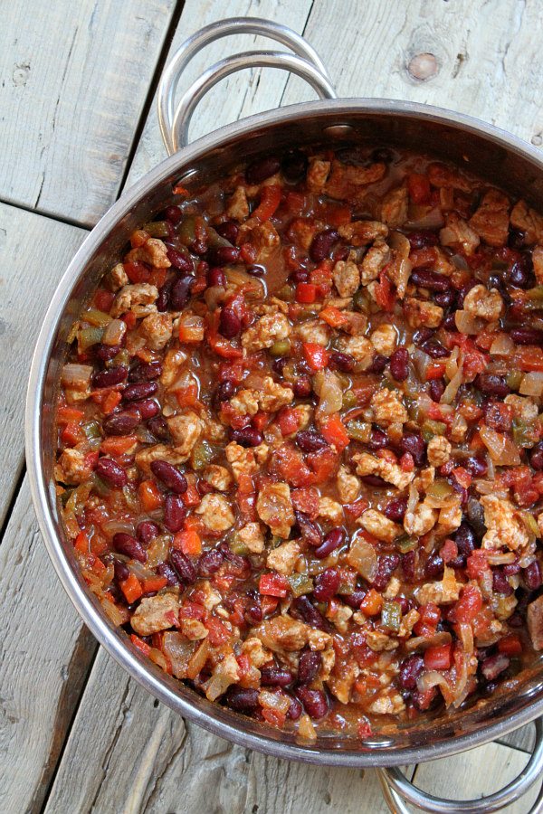 Quick and Easy Pork and Bean Chili recipe - from RecipeGirl.com. I love this recipe so much- chili with a sweet and smoky flavor, perfect comfort food recipe for a chilly day.
