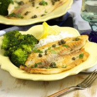 Ready in 10 minutes, this Easy Tilapia Piccata from RecipeGirl.com is a family weeknight favorite dinner recipe.