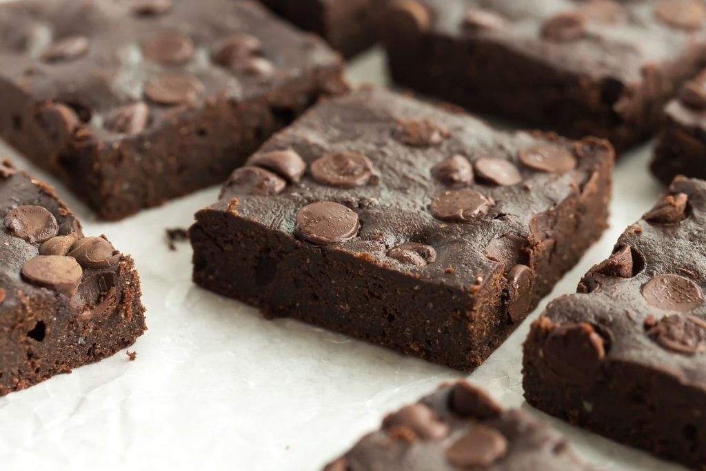 These Healthier Fudge Brownies are low fat, low sugar, and whole grain but you would never know! They are rich and chocolatey and make the perfect healthy treat! - from RecipeGirl.com