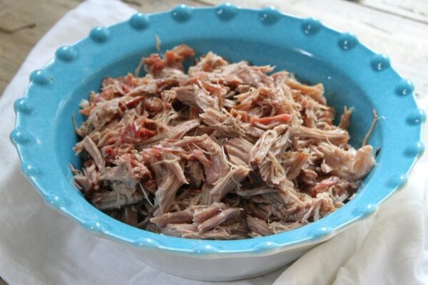 Slow Cooker Kalua Pig (pulled pork) recipe- seriously the BEST pulled pork recipe I've tried - from RecipeGirl.com
