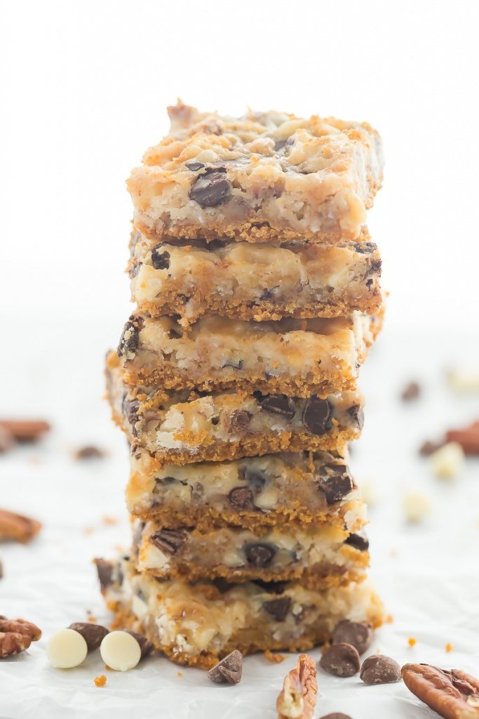 These Seven Layer Bars have a graham cracker crust and are piled with nuts, coconut, chocolate chips and white chocolate chips. Recipe from RecipeGirl.com.