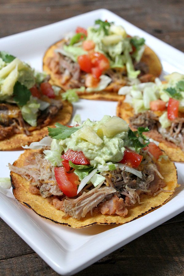 Carnitas Tostadas with Pineapple Guacamole - recipe from RecipeGirl.com