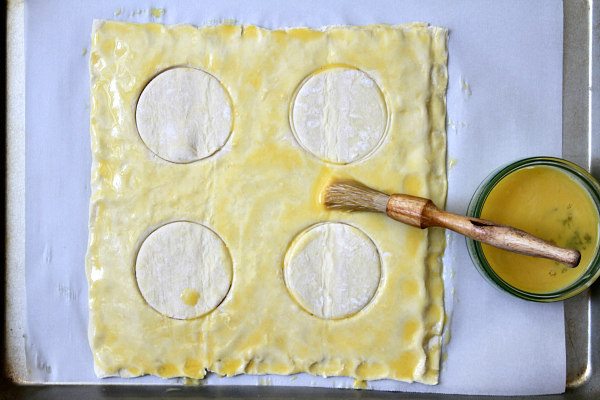 Puff Pastry with round cut outs and egg wash