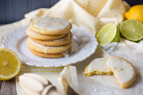 Iced Lemon Lime Cookies stacked on a plate