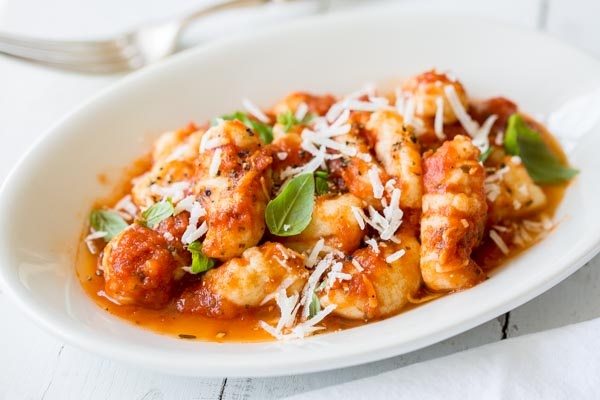 Potato Gnocchi From Scratch with marinara sauce in a white dish