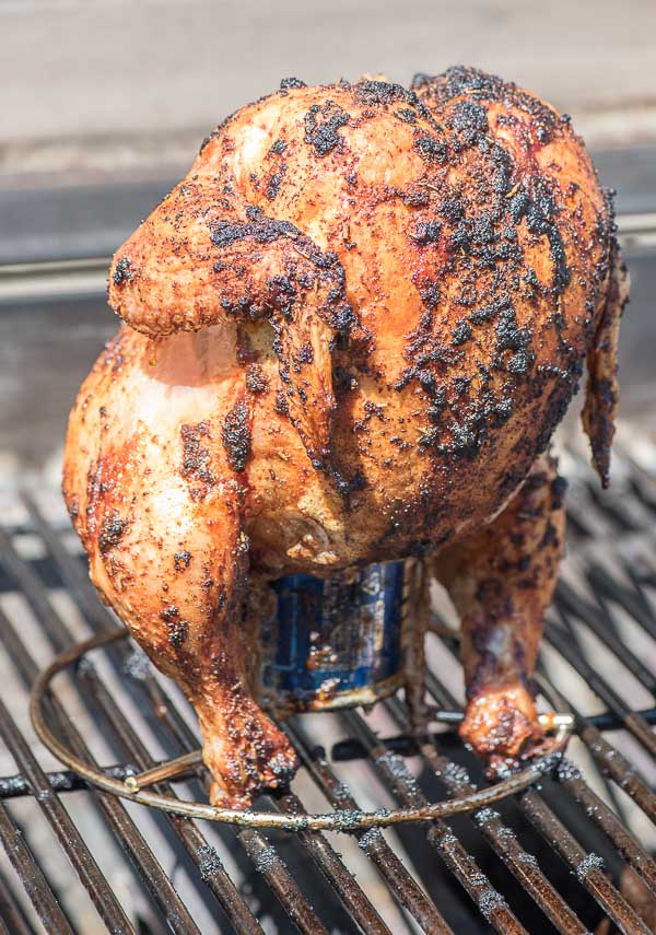 Beer Can Chicken on a rack on the grill