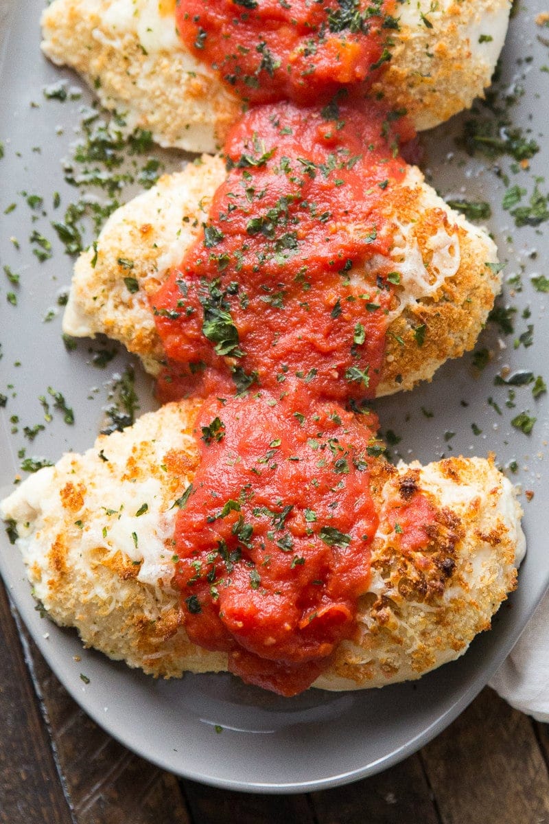 Light Chicken Parmesan recipe from RecipeGirl.com #light #skinny #chicken #parm #parmesan #baked #recipe #RecipeGirl #ww #wwfreestyle #weightwatchers #dinner Light Chicken Parmesan