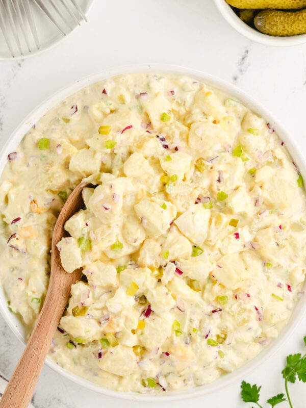 bowl of american potato salad with spoon