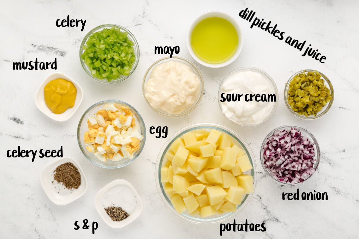 The perfect potato salad for every barbecue! American Potato Salad recipe from RecipeGirl.com ingredients displayed for making american potato salad