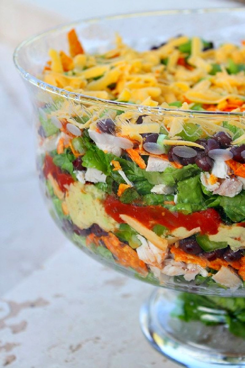 layered nacho salad in bowl