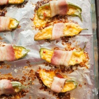 pimento jalapeno poppers on baking sheet