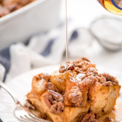 slice of pumpkin french toast casserole with syrup