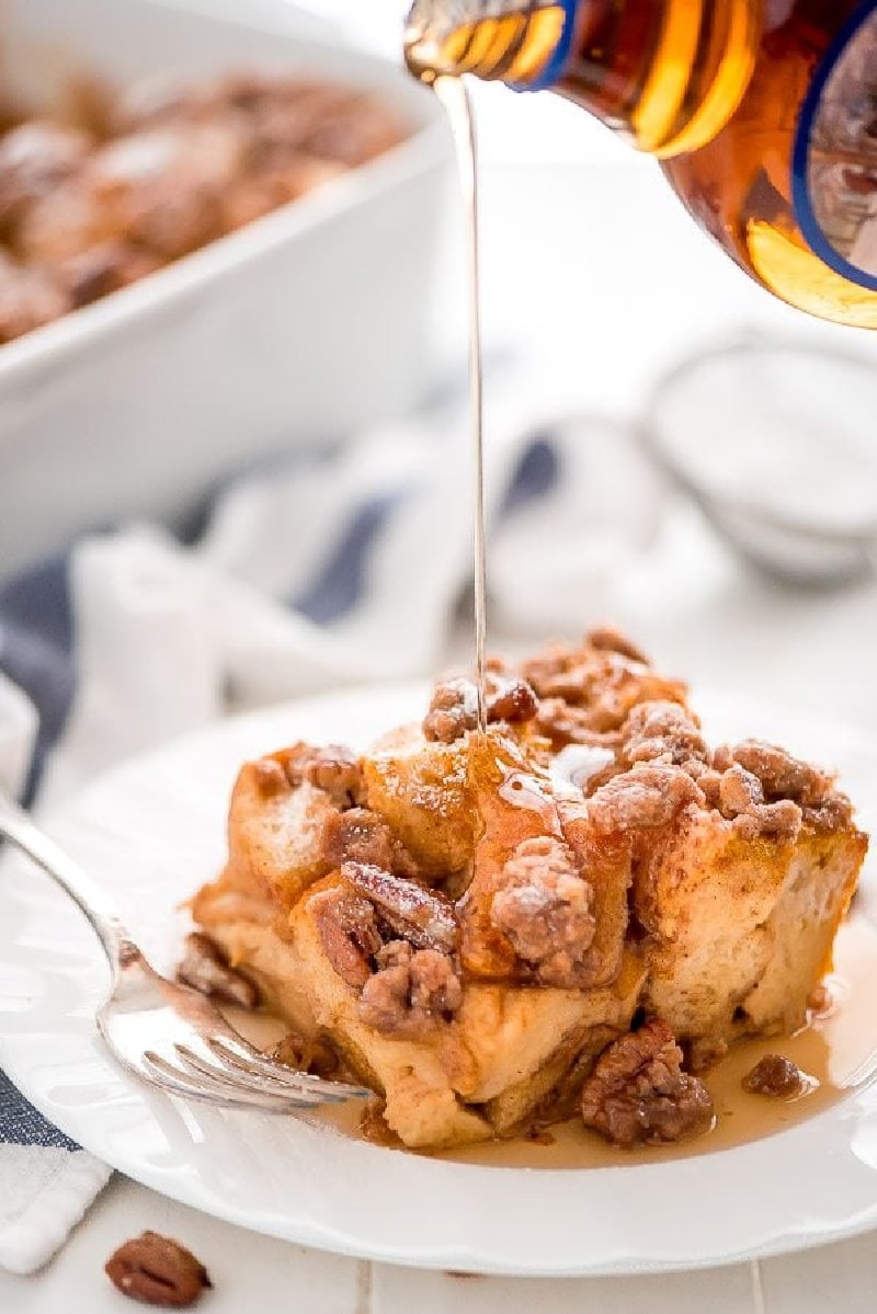 slice of pumpkin french toast casserole with syrup