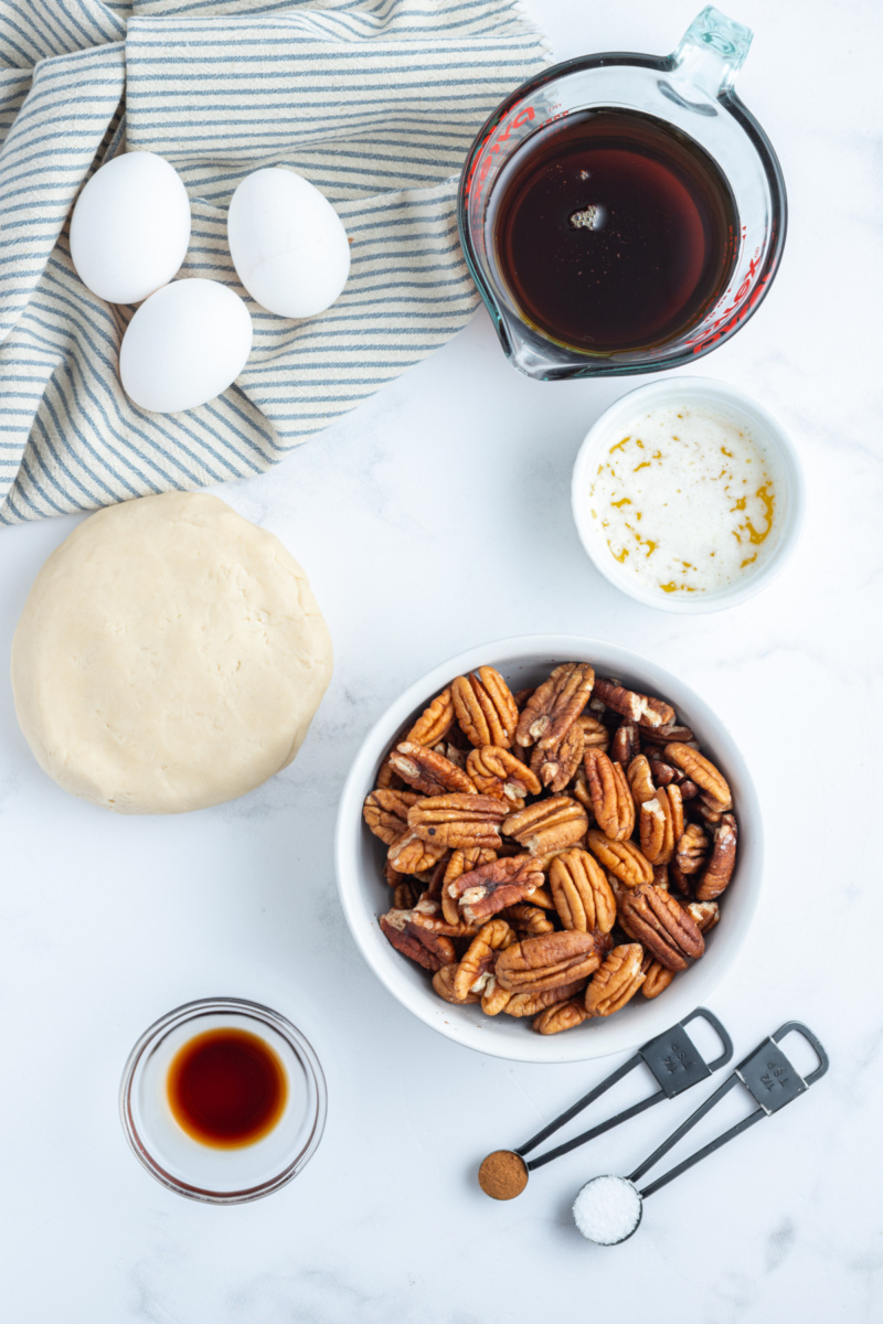 ingredients displayed for making pecan pie