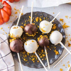 pumpkin cake pops on a plate