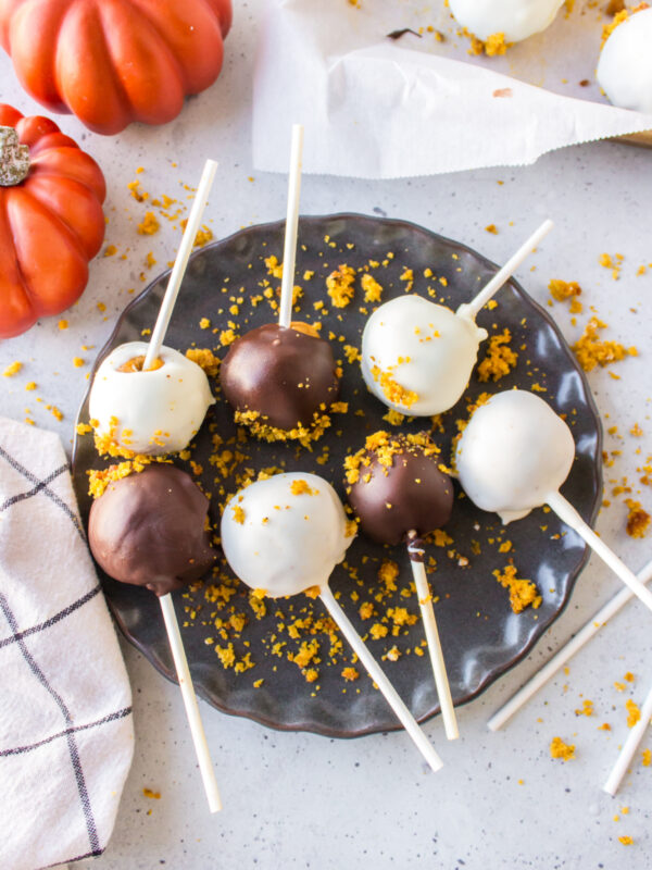 pumpkin cake pops on a plate