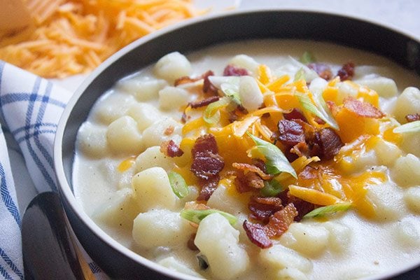 Loaded Potato Soup in a white bowl