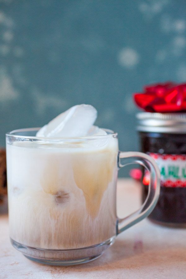 Homemade Kahlua liqueur used for a White Russian in a mug