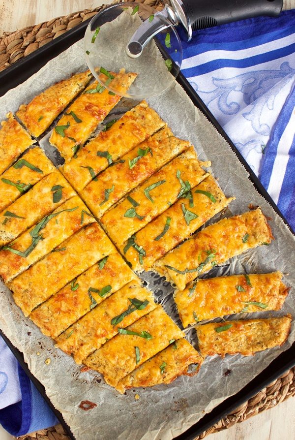 Easy Cheesy Cauliflower Breadsticks recipe by RecipeGirl.com