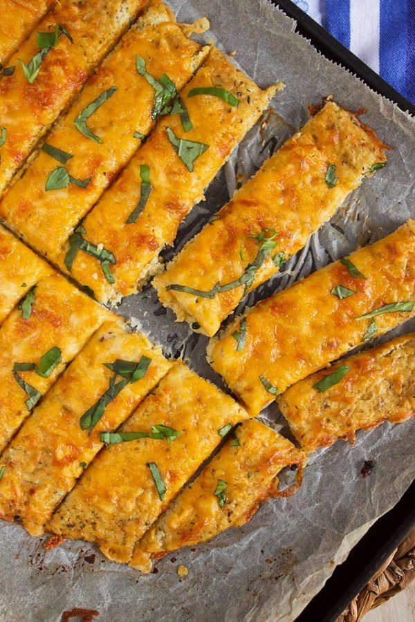 Easy Cheesy Cauliflower Breadsticks recipe by RecipeGirl.com