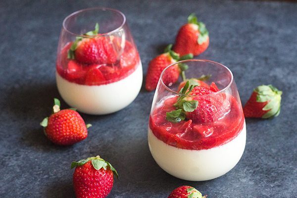 Vanilla Panna Cotta with Strawberry Sauce recipe from RecipeGirl.com