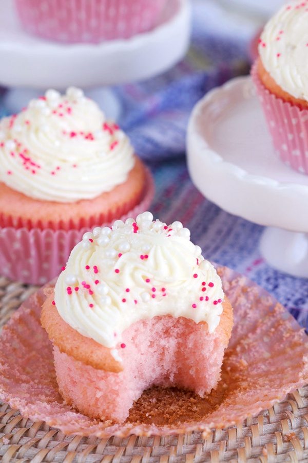 Eating Pink Champagne Cupcakes with Cream Cheese Frosting 