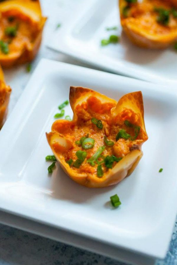 baked Buffalo Chicken Wonton Cups on a white plate