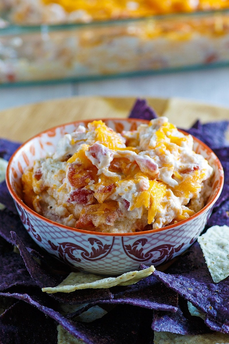 Hot Chicken Enchilada Dip surrounded by tortilla chips