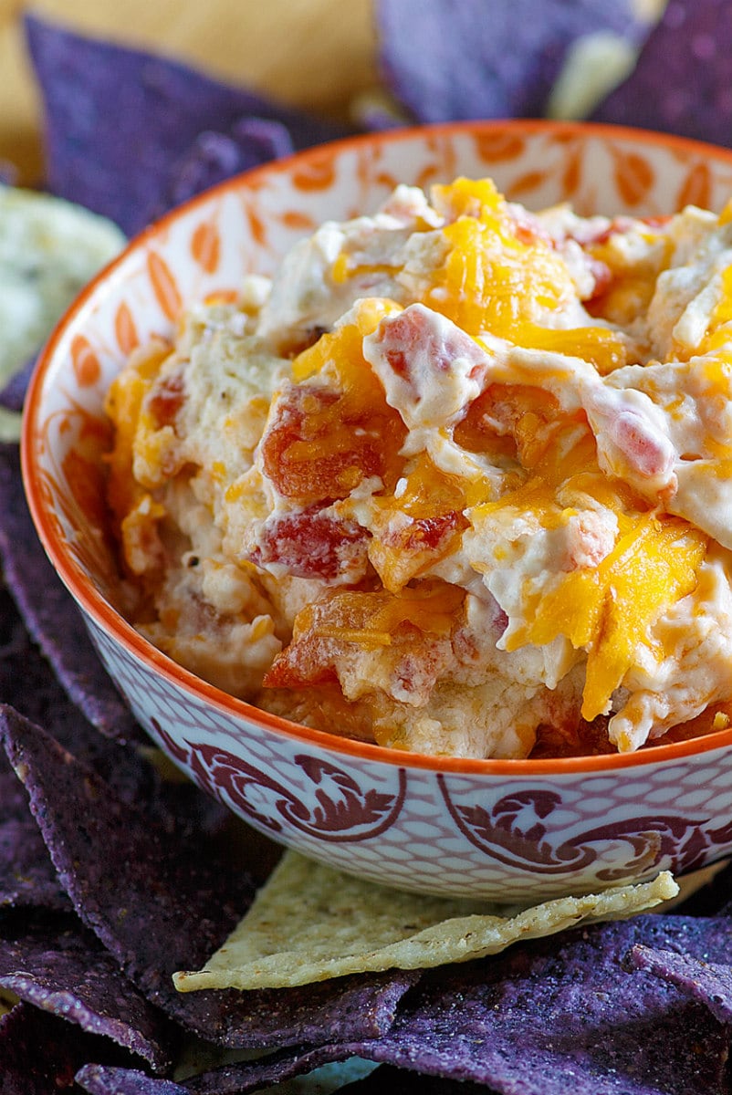 Hot Chicken Enchilada Dip in a colorful bowl