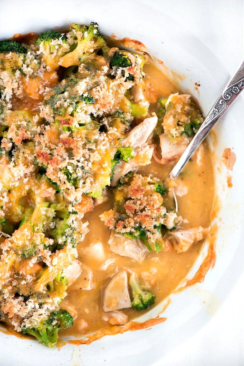 Chicken Divan recipe from RecipeGirl.com #chicken #divan #easy #familyfriendly #dinner #recipe #RecipeGirl Chicken Divan in dish with spoon