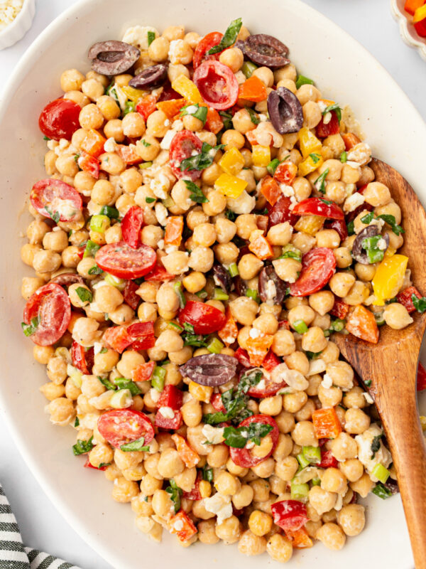 mediterranean chickpea salad in bowl with spoon