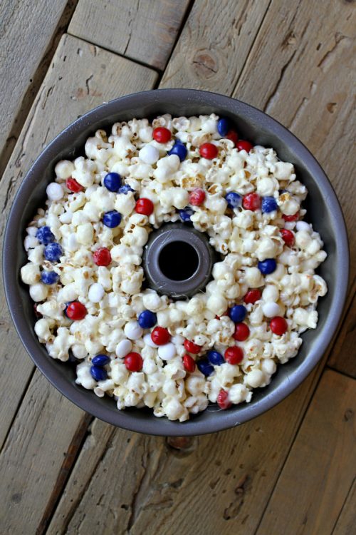 Patriotic Marshmallow Popcorn Cake in a bundt pan