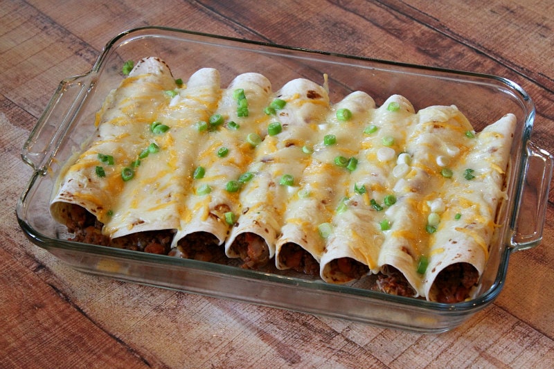 beef burrito casserole in a glass casserole dish