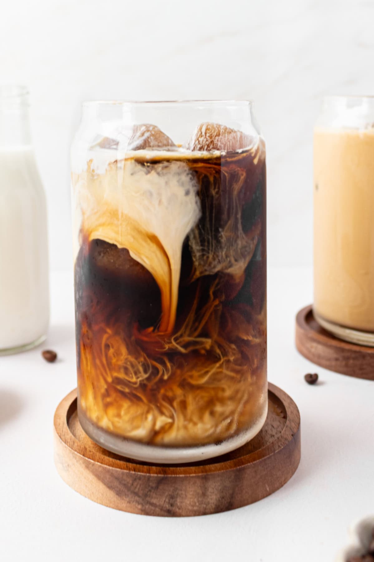 Best Iced Coffee Recipe from RecipeGirl.com : how to make iced coffee iced coffee in glass with cream