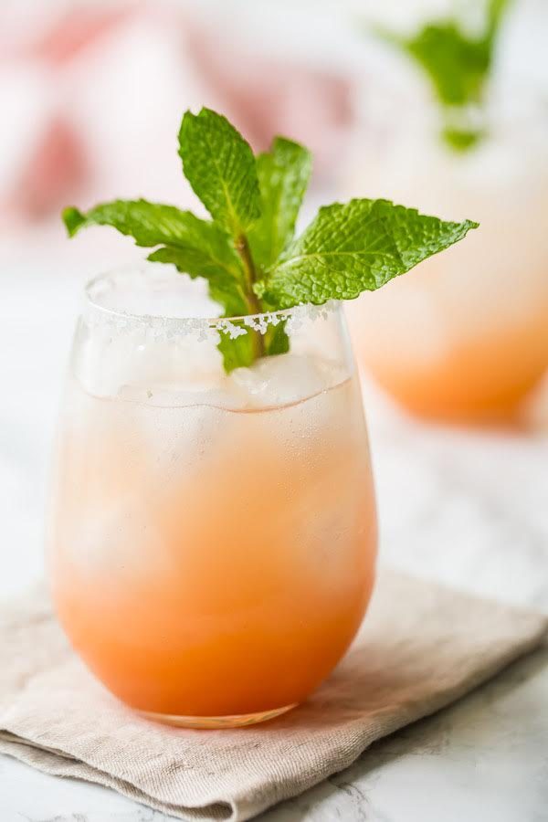 Paloma Cocktail garnished with mint