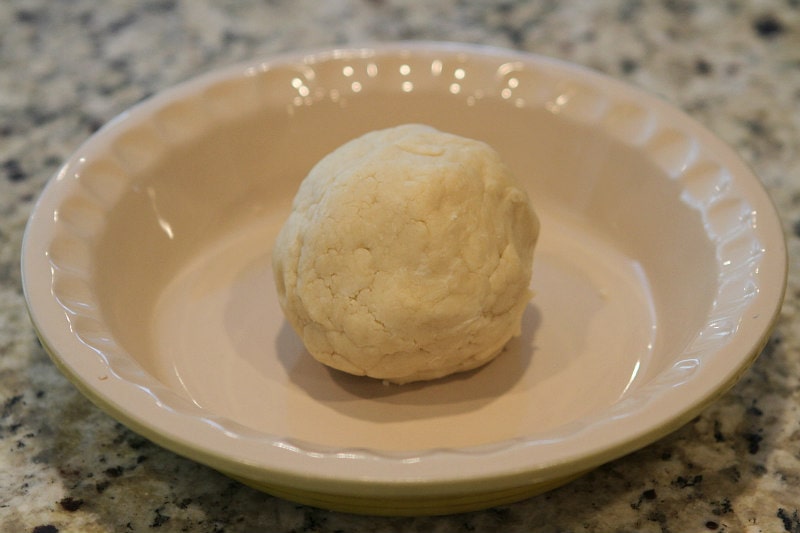 Ball of Cream Cheese Pie Crust ready to be pressed into the pie plate