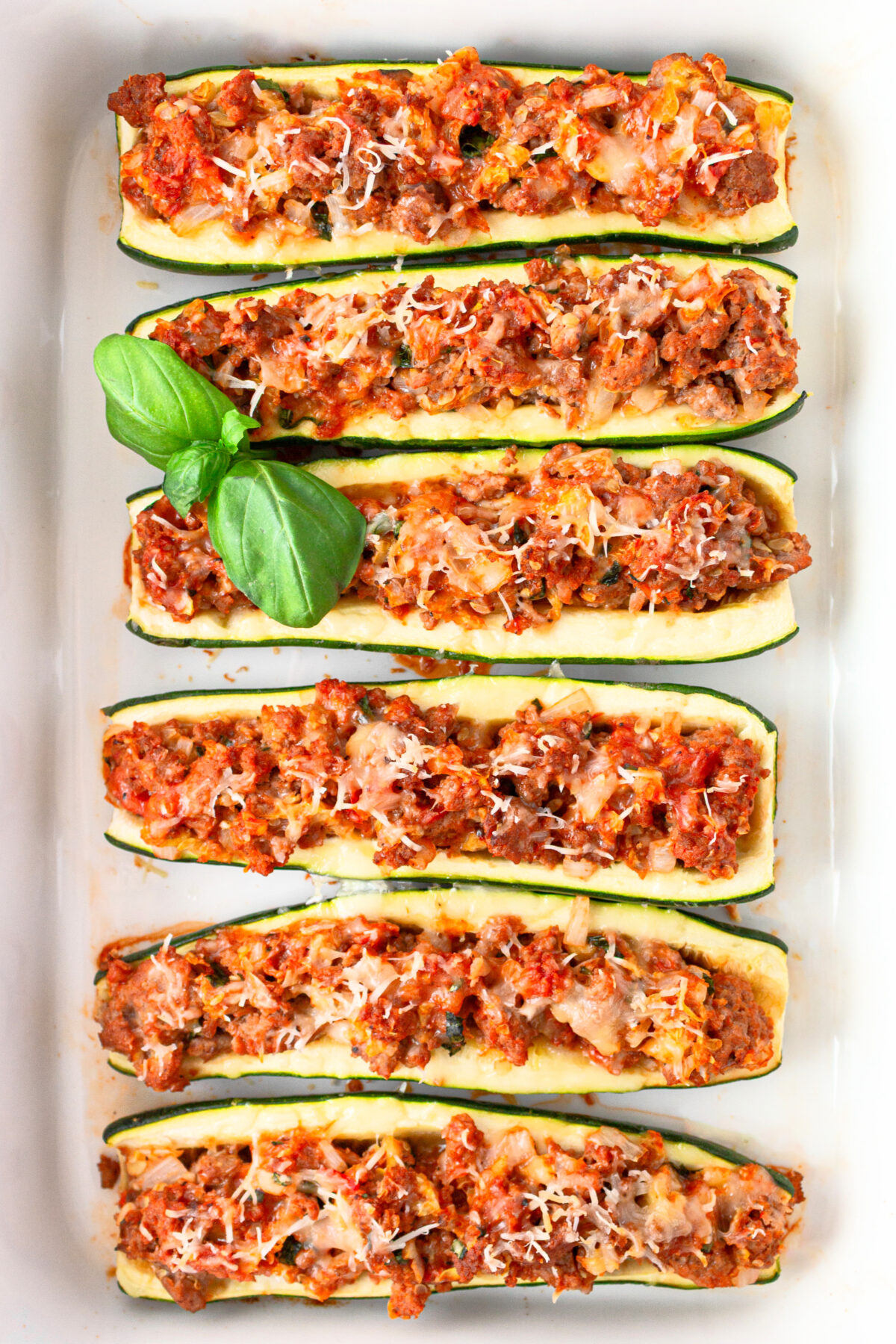 Sausage Stuffed Zucchini Boats Recipe : from RecipeGirl.com : summer zucchini recipe sausage stuffed zucchini in a baking pan