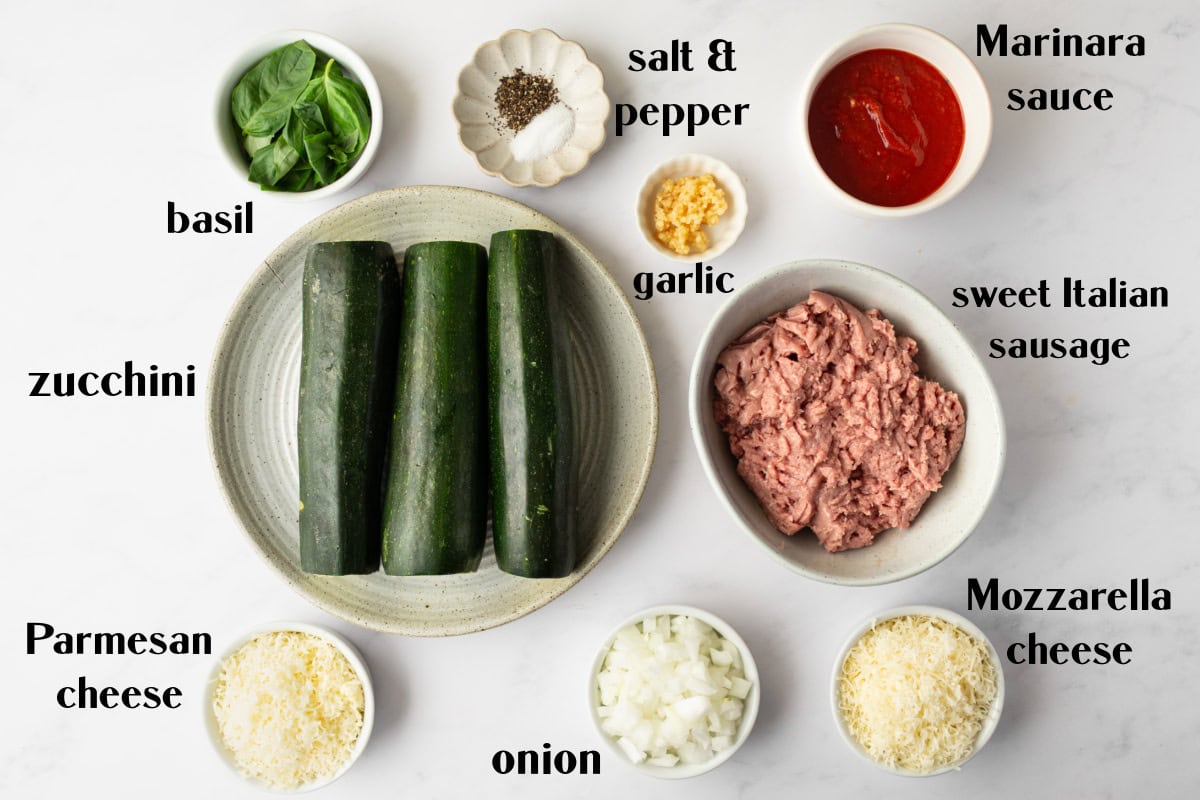 Sausage Stuffed Zucchini Boats Recipe : from RecipeGirl.com : summer zucchini recipe ingredients displayed for making sausage stuffed zucchini