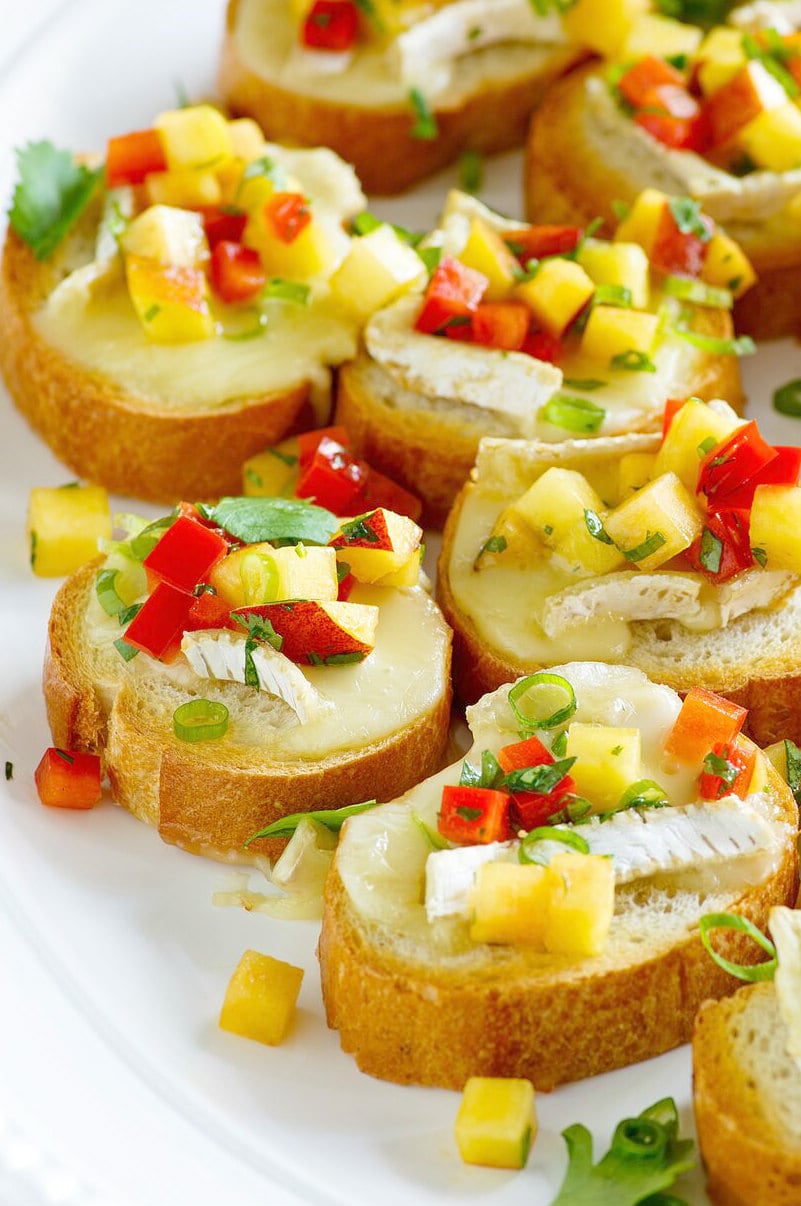 Peach and Brie Bruschetta on a white platter