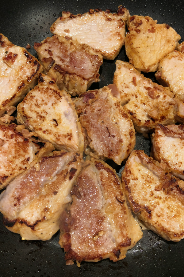 Pork Loin cooking in a skillet