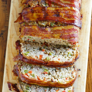 pinterest image for bacon wrapped meatloaf