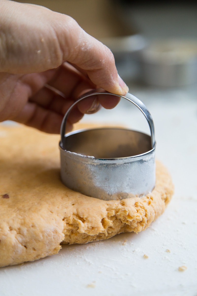 Cutting dough for Sweet Potato Biscuits