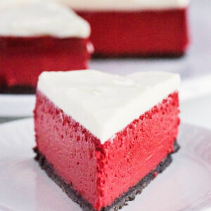 slice of red velvet cheesecake on plate