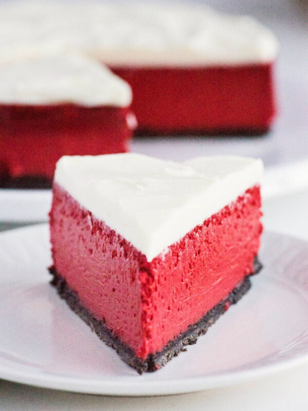 slice of red velvet cheesecake on plate