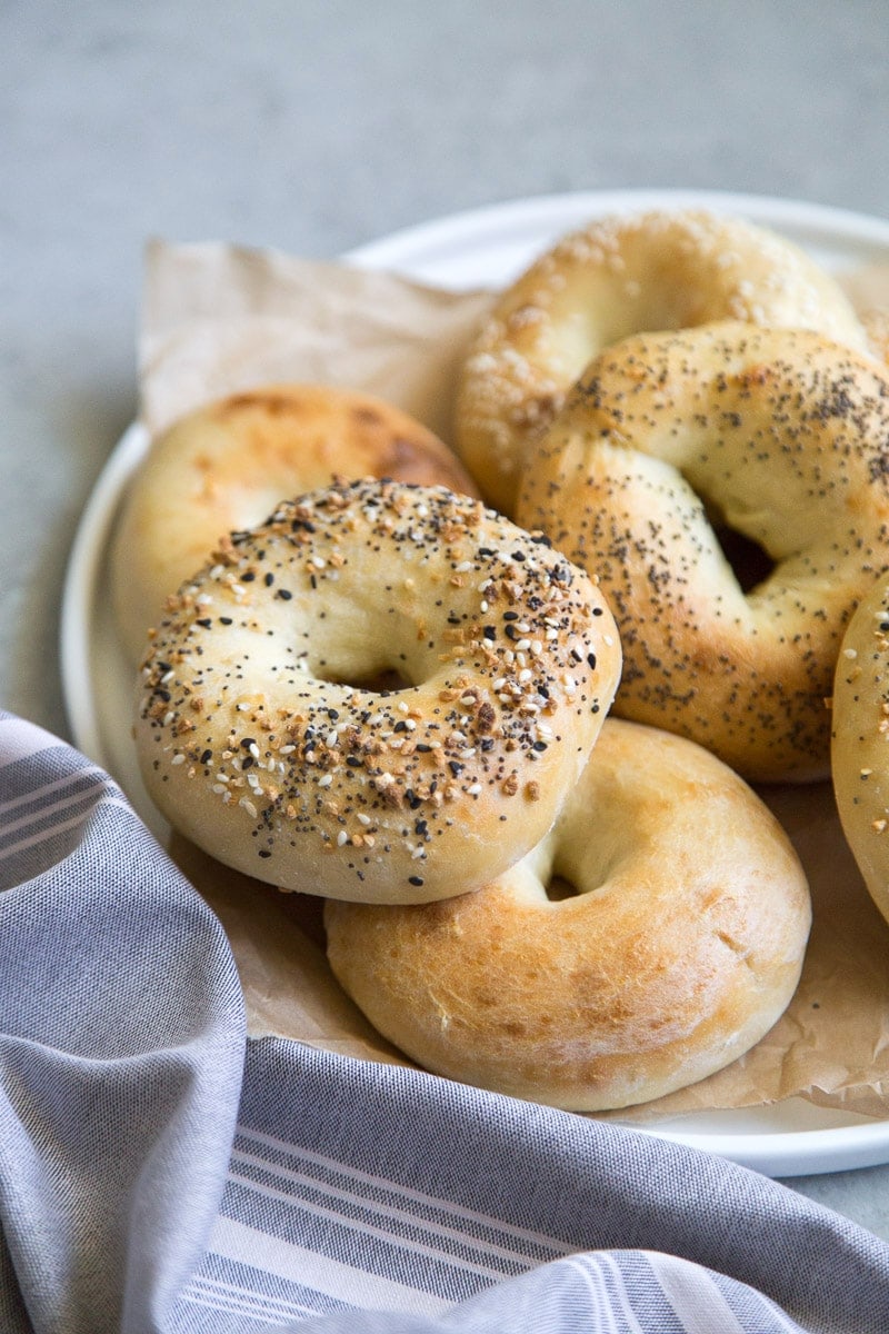 platter of 2 Ingredient Bagels with decorative blue and white striped napkin