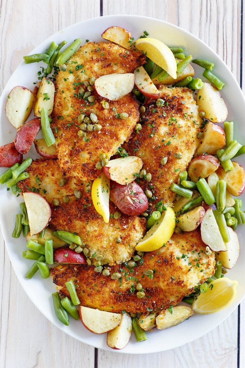 Crispy Chicken Schnitzel recipe from RecipeGirl.com #crispy #chicken #schnitzel #sheet #pan #sheetpan #dinner #recipe #RecipeGirl #weight #watchers #weightwatchers #freestyle #smartpoints #freestylesmartpoints #wwfreestyle Crispy Chicken Schnitzel
